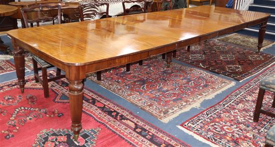 A late Victorian mahogany extending dining table on fine fluted tapered legs. 400cm extended